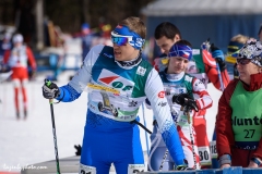 Kevin Hallop, Estonia, waits at the start of the sprint with his hand on the map, ready to place it in the map holder before sprint start, International Orienteering Federation World Cup, Craftsbury Outdoor Center, Craftsbury, VT. Map can only be received 15 seconds before the start.