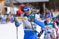 Kevin Hallop, Estonia, places map into holder, International Orienteering Federation World Cup sprint, Craftsbury Outdoor Center, Craftsbury, VT.