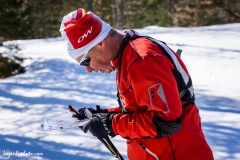 Competitor studies his map, mid-race, in the middle distance race, International Orienteering Federation World Masters Championship, Middle 1, Craftsbury Outdoor Center, Craftsbury, VT.