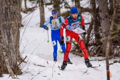 Simon Suciu, Romania, leads Estonian Kevin Hallop in the middle distance race at the International Orienteering Federation World Cup, Craftsbury, VT.