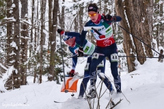 A near miss as competitors Tero Linnainmaa (FIN) and Jorgen Madslien (NOR) arrive at a check point at the same time in the mixed relay at the International Orienteering Federation World Cup at Craftsbury Outdoor Center, Craftsbury, VT.